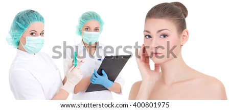 plastic surgery concept - two female doctors and beautiful patient woman isolated on white background