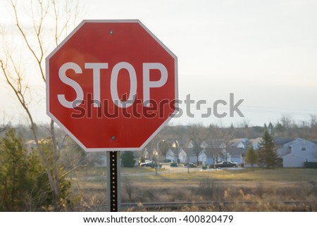 Stop sign against a blue sky