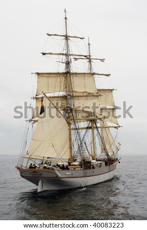 Old ship with white sales in the baltic sea