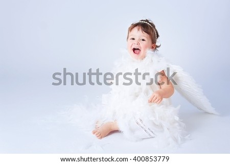 Cute little girl with angel wings