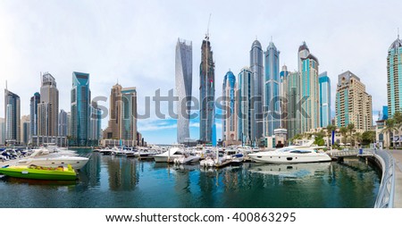 Panorama of Dubai Marina in a summer day, UAE Royalty-Free Stock Photo #400863295