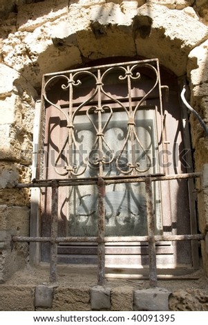  the antique window in stone wall