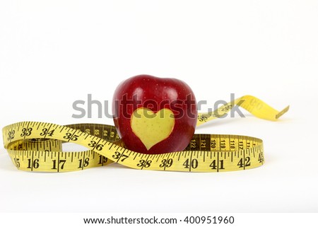 wrapped centimeter diet red apple on a white background