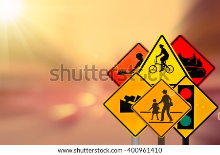 Set of traffic sign on motion blur road traffic background.