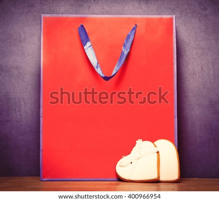 red packet and cookies on the purple background