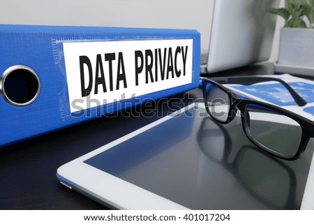 Data Privacy Concept Office folder on Desktop on table with Office Supplies. ipad