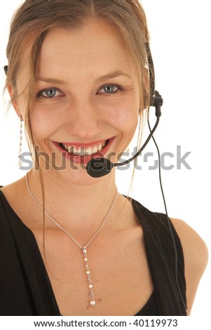 Portrait of a beautiful young Caucasian businesswoman wearing phone headset on white background. NOT ISOLATED
