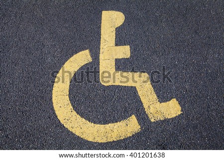 The Disabled symbol painted on a Road.
