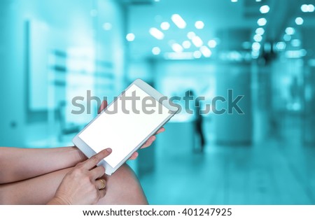 Shopping Online With Digital laptop on Abstract blurred photo with people in department store bokeh, technology and internet concept