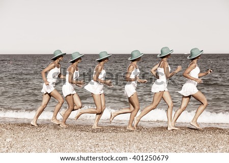 Woman running on the beach. Multiple exposure shot.