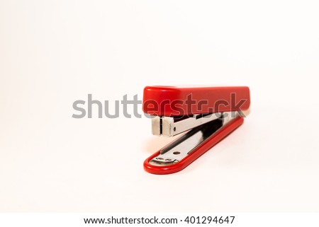 Red Stapler on white background 