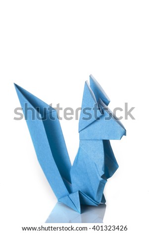 A squirrel origami made of blue paper isolated on white background.