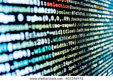 Developer working on program codes in office. Software background. Monitor photo. Writing program code on computer. Programming code. Programmer workplace. Software source code. 
