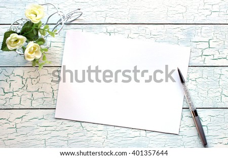 Mockup for presentations with little bicycle, blank card and a pen.