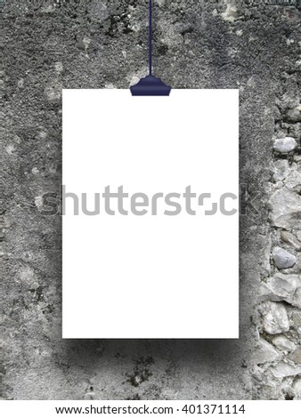 Close-up of one blank frame hanged by clip against grey weathered concrete wall background