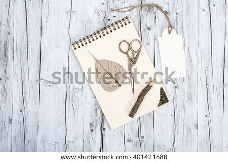 Antique still life on wooden table. Vintage paper and envelope on wood background