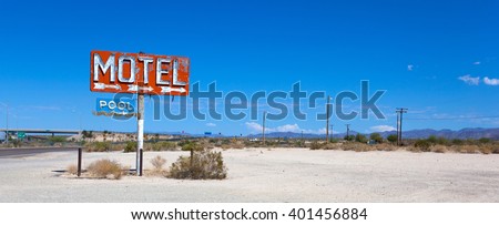 Old, abandoned motel sign in the dessert on Route 66