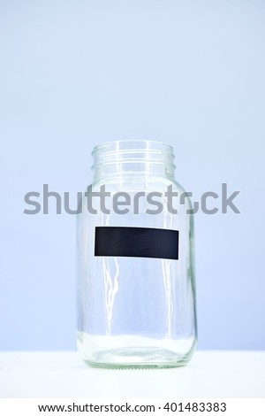 A studio photo of a money jar