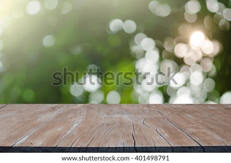 Wood table top on shiny bokeh  background