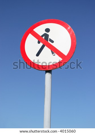 sign with crossed pedestrian on blue sky