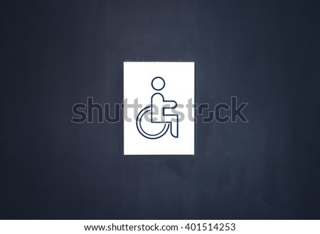 disabled sign toilet on door