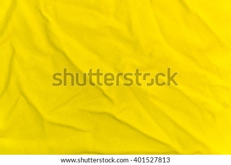 The wrinkled bright yellow knitted fabric for the background