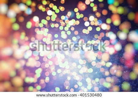 Festive background with natural and bright lights. Vintage Magic background with colorful . Summer Christmas New Year disco party background.