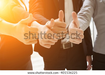 Group of business people showing thumb up gesture Royalty-Free Stock Photo #401536225