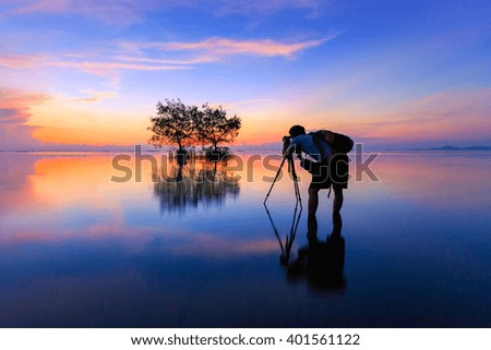 photographer in action at sea,thailand