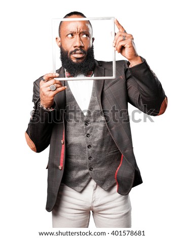 business black man holding a frame