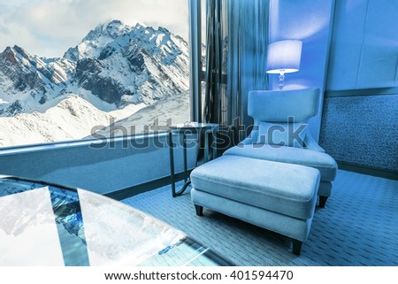 Sofa in living room in Snow Moutain Background
