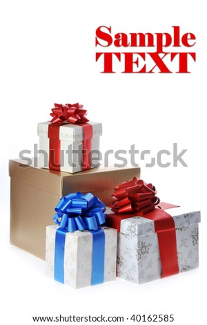  packed gifts stand on white surface