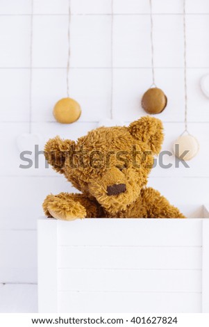 Macarons on Wooden background with Adorable  Teddy Bear Plush, Sweet and Romantic Concept