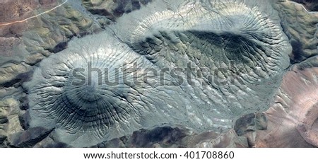 the enchanted mountain, abstract photography of the deserts of Africa from the air. aerial view of desert landscapes, Genre: Abstract Naturalism, from the abstract to the figurative, 