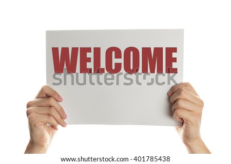 Hand holding a banner with the showing welcome message