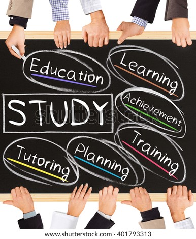 Photo of business hands holding blackboard and writing STUDY concept