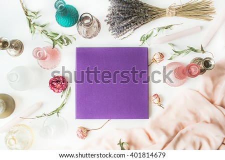 purple wedding or family photo album, roses, lavender, green eucalyptus branches, candles, candlesticks, pink dress isolated on white background. flat lay, overhead view