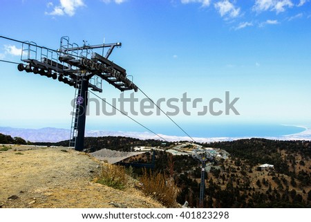 Landscape view from Troodos mountains with the machinery of the ski lift in the foreground, Cyprus
