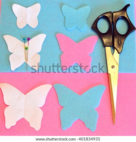 Felt butterfly, scissors, pins, paper templates. Sewing set