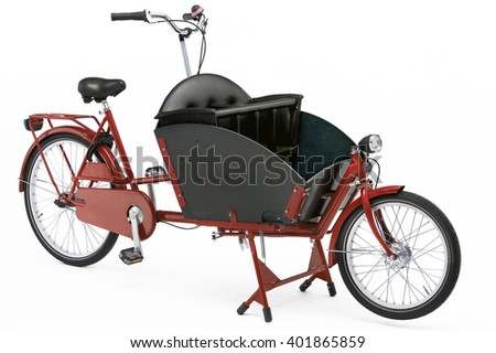 Brown colored cargo bicycle on white background