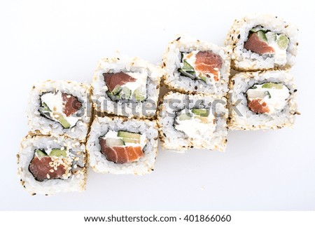 Sushi rolls with sesame seeds on the white background