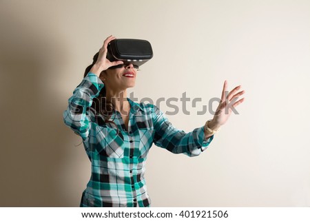 woman with glasses of virtual reality, vr, woman living experience with their hands, VR glasses