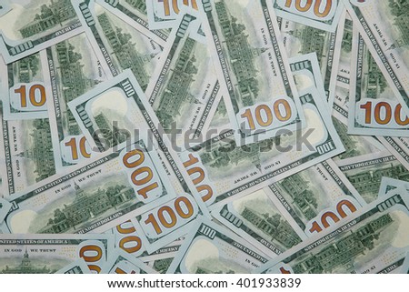 Background of 100 dollar bills. Large surface covered with US cash notes.