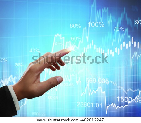 Businessman with financial symbols coming