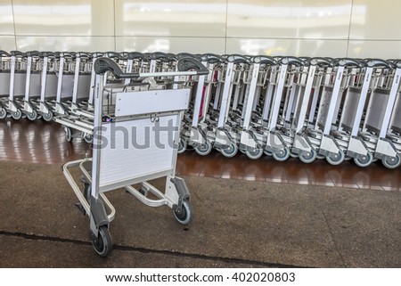 The airport trolley Royalty-Free Stock Photo #402020803