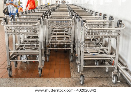 The airport trolley Royalty-Free Stock Photo #402020842