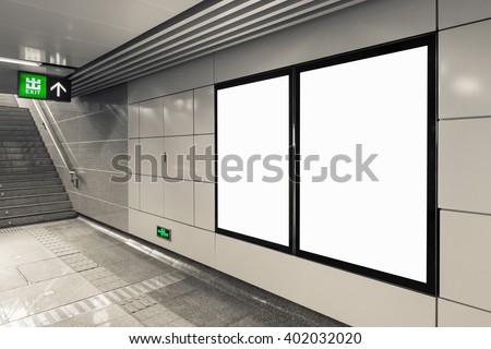 blank billboard at the subway station exit