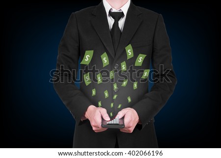 Businessman holding a mobile phone with money flting out