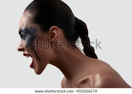 Screaming beauty Model with American Indian Makeup