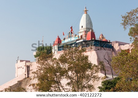 Mansa Devi Temple is a Hindu temple dedicated to goddess Mansa Devi in the holy city of Haridwar in the Uttarakhand state of India.  Royalty-Free Stock Photo #402122272